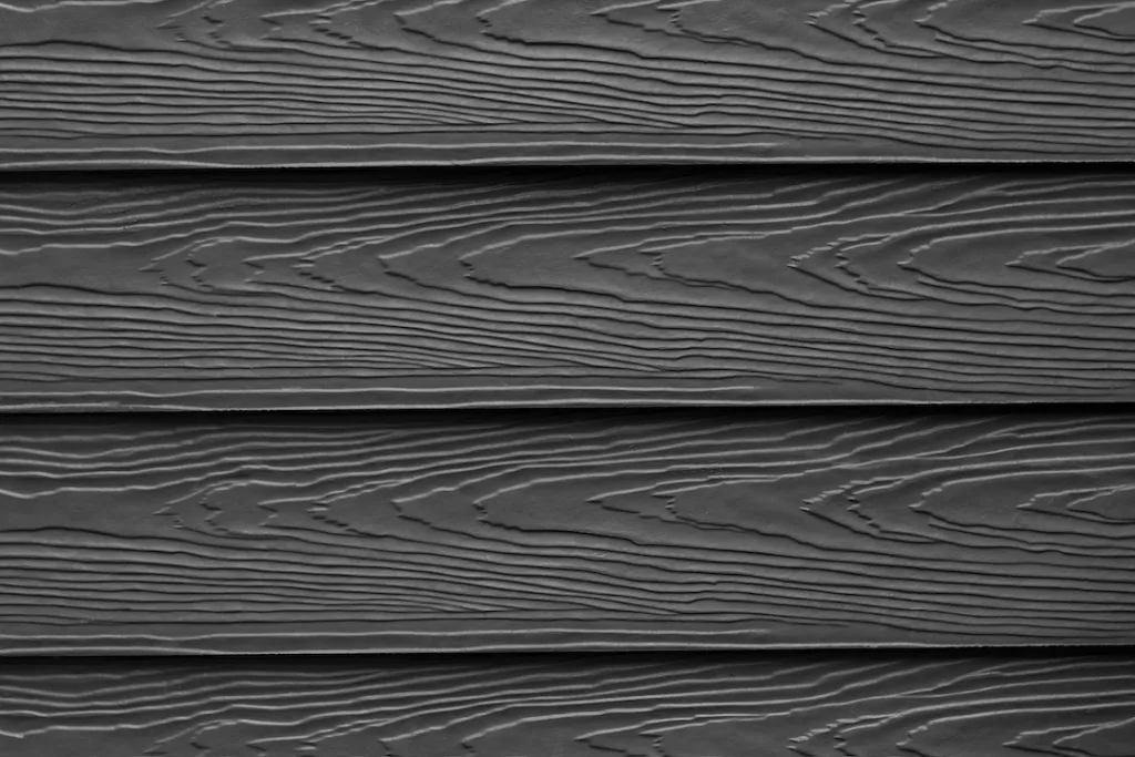 Wood substitute board and high quality fiber cement board texture for architect, Black wood texture and background, Wood plank with patterns for design and cement striped wood wall