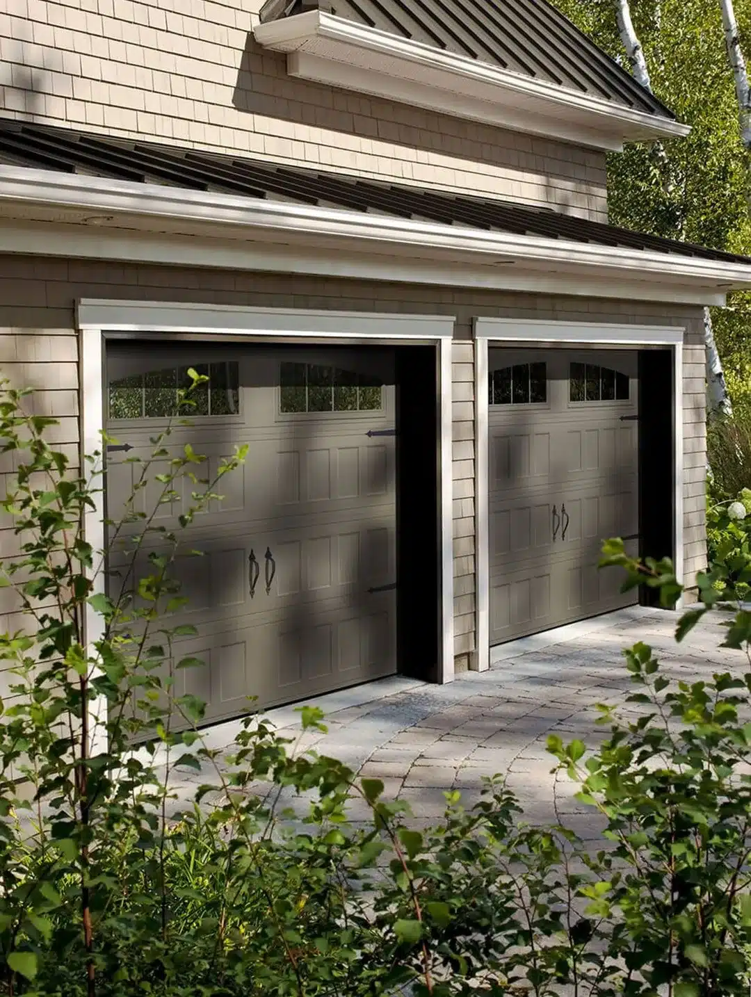 Garaga Regal Shaker garage door in Terrastone with Richmond arch window inserts