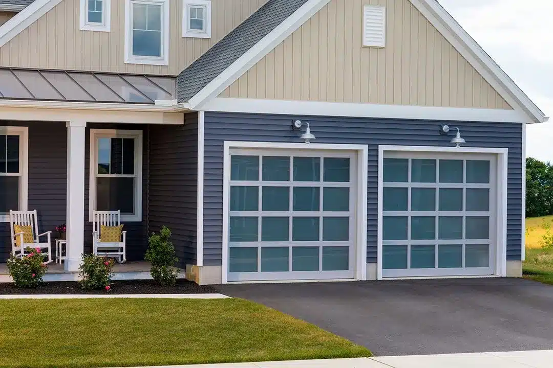 Clear anodized aluminum modern garage door featuring contemporary sleek design